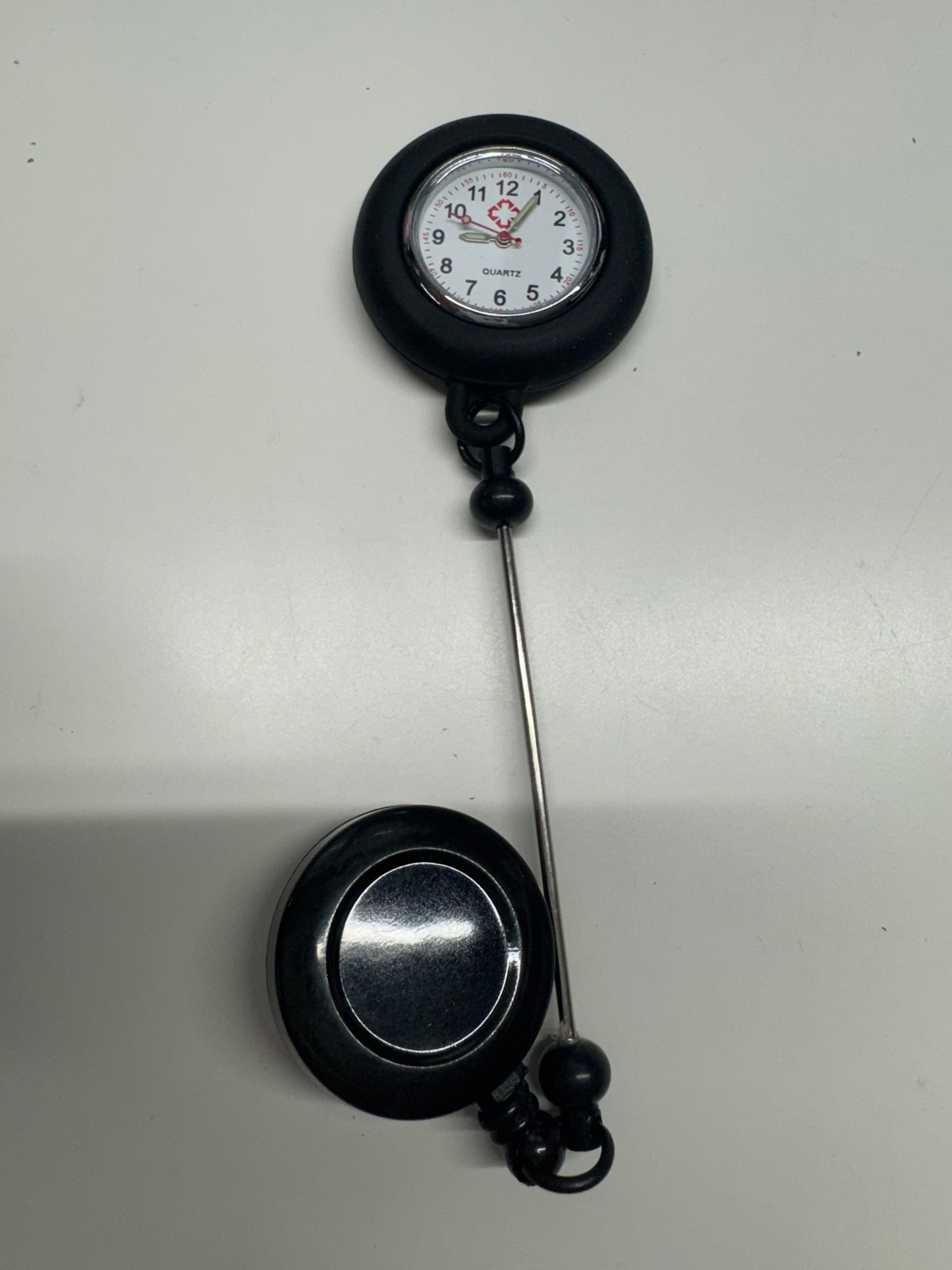 Badge reels with clock