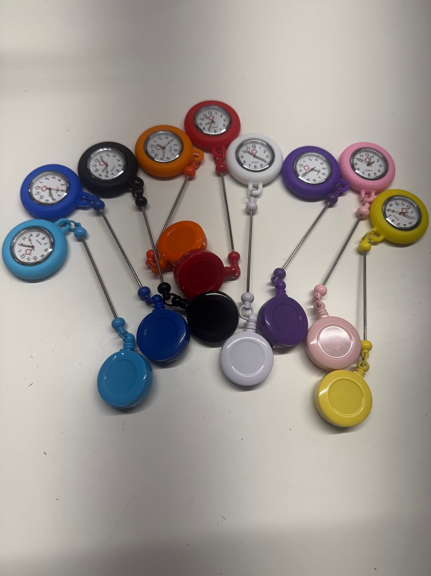 Badge reels with clock