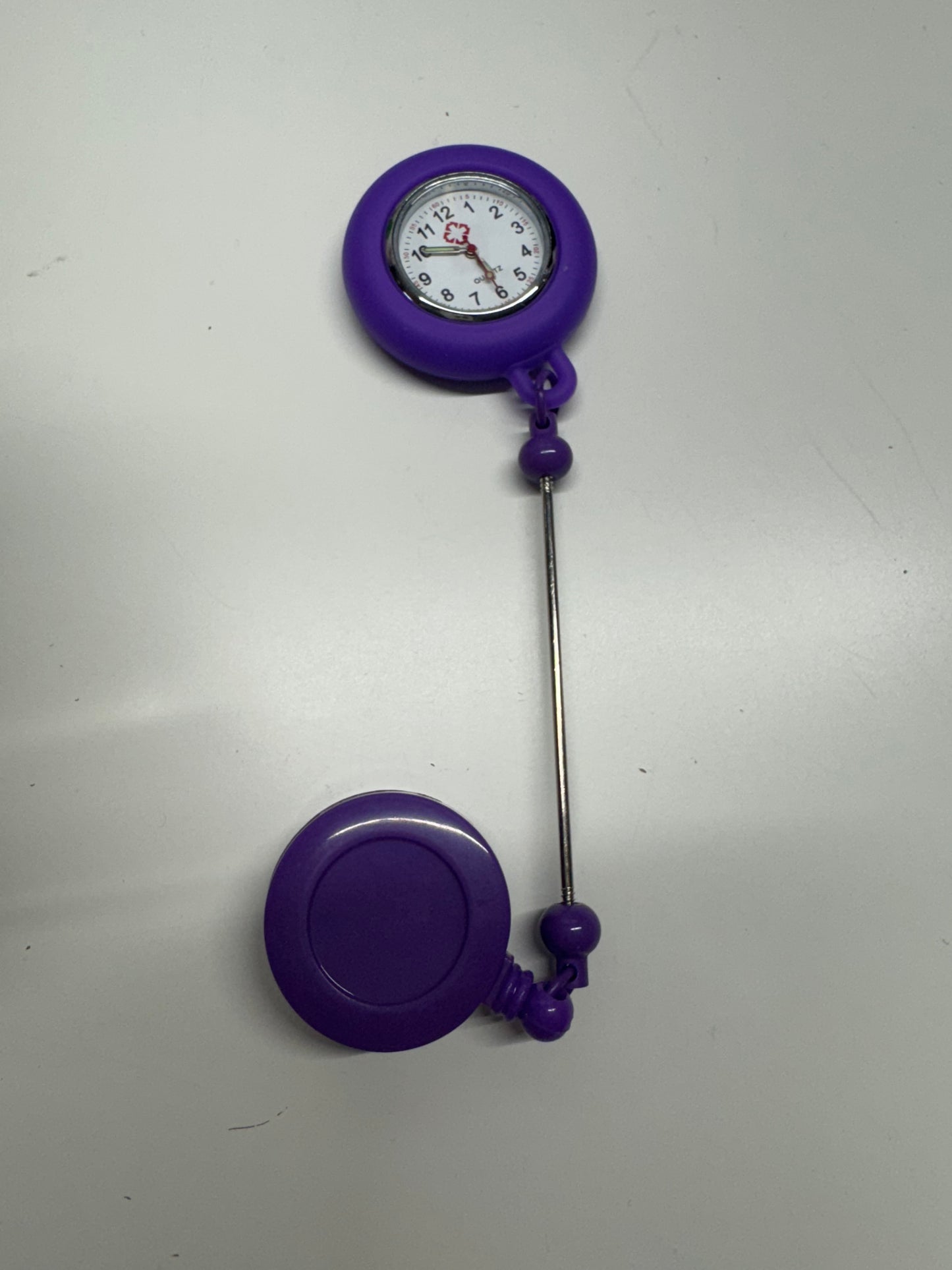 Badge reels with clock