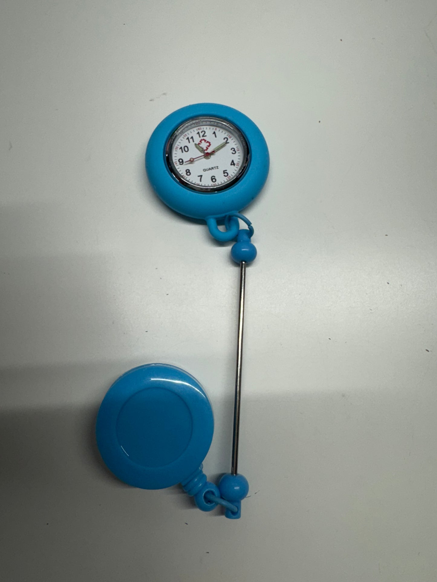 Badge reels with clock